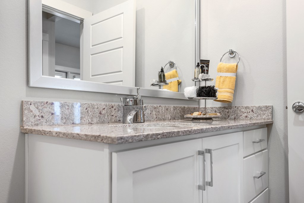 bathroom area of an apartment at ironridge at hill country village
