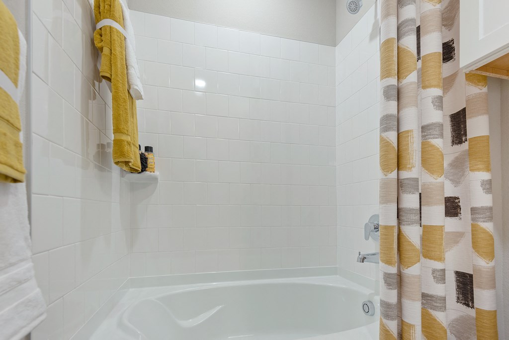 shower area of an apartment at ironridge at hill country village
