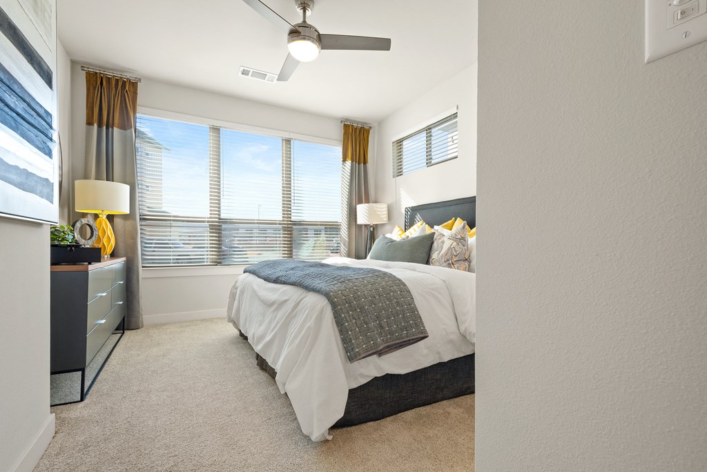 bedroom of an apartment at ironridge at hill country village
