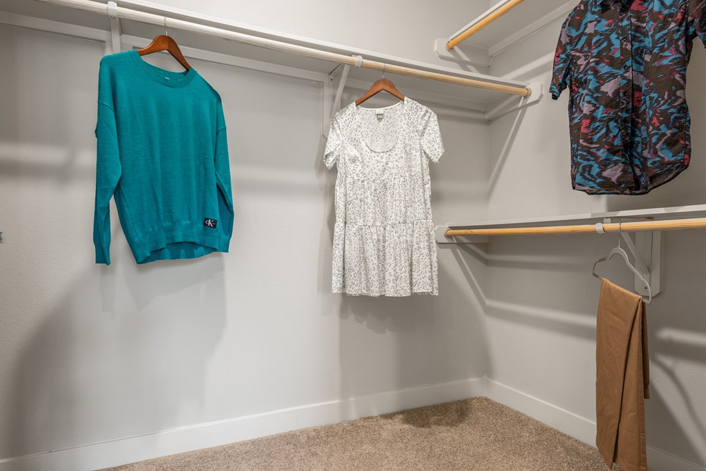 closet of an apartment at ironridge at hill country village