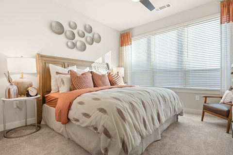 bedroom of an apartment at ironridge at hill country village