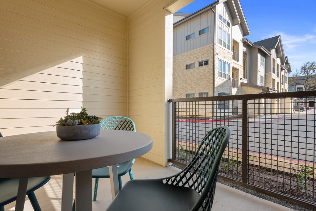 outdoor deck of an apartment at ironridge at hill country village