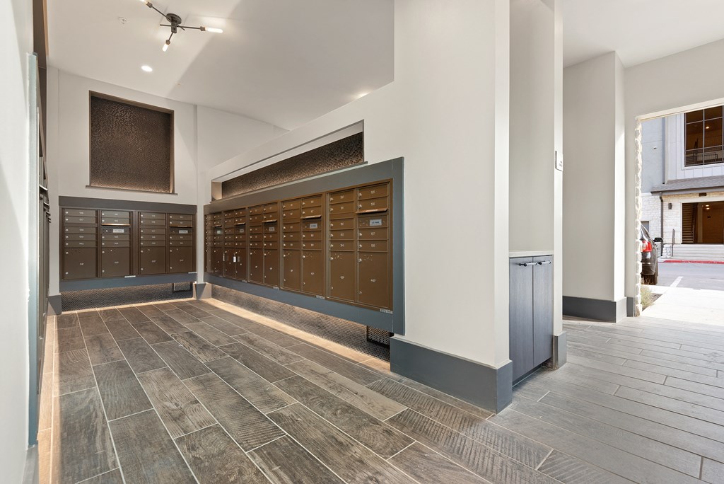 a view of the lobby of a building with lockers