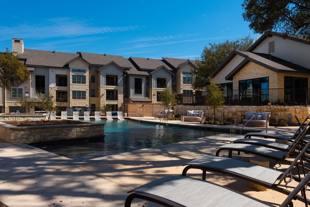 our apartments have a large pool and lounge chairs
