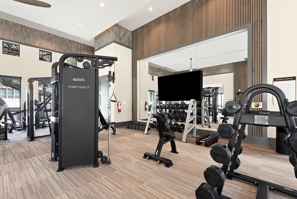 fitness room at ironridge at hill country village apartments