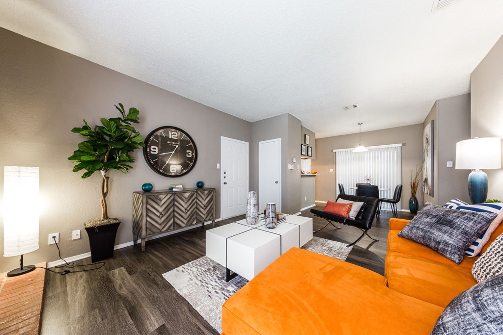 Living room with kitchen and dining at Arboretum Oaks, Austin, Texas
