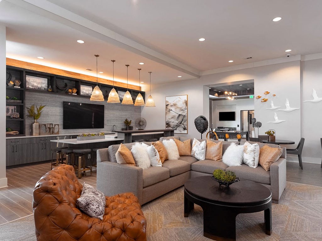 a living room with a couch and a table