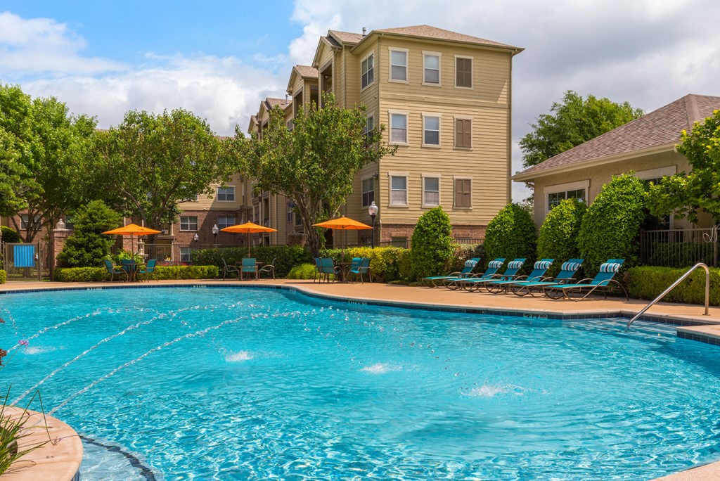 our apartments have a large swimming pool with chairs