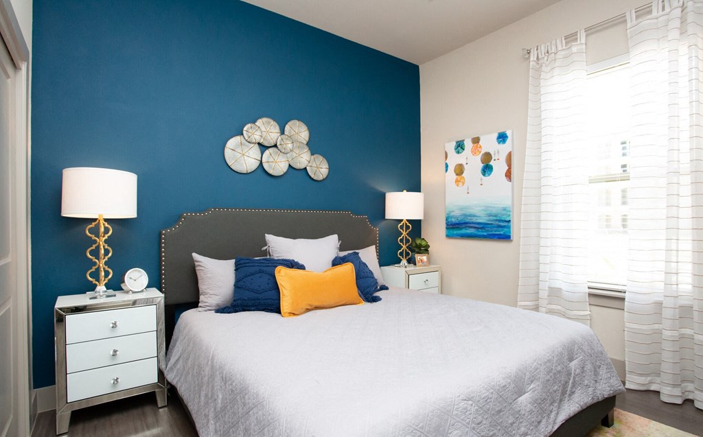 bedroom at mela's luxury apartments in san antonio