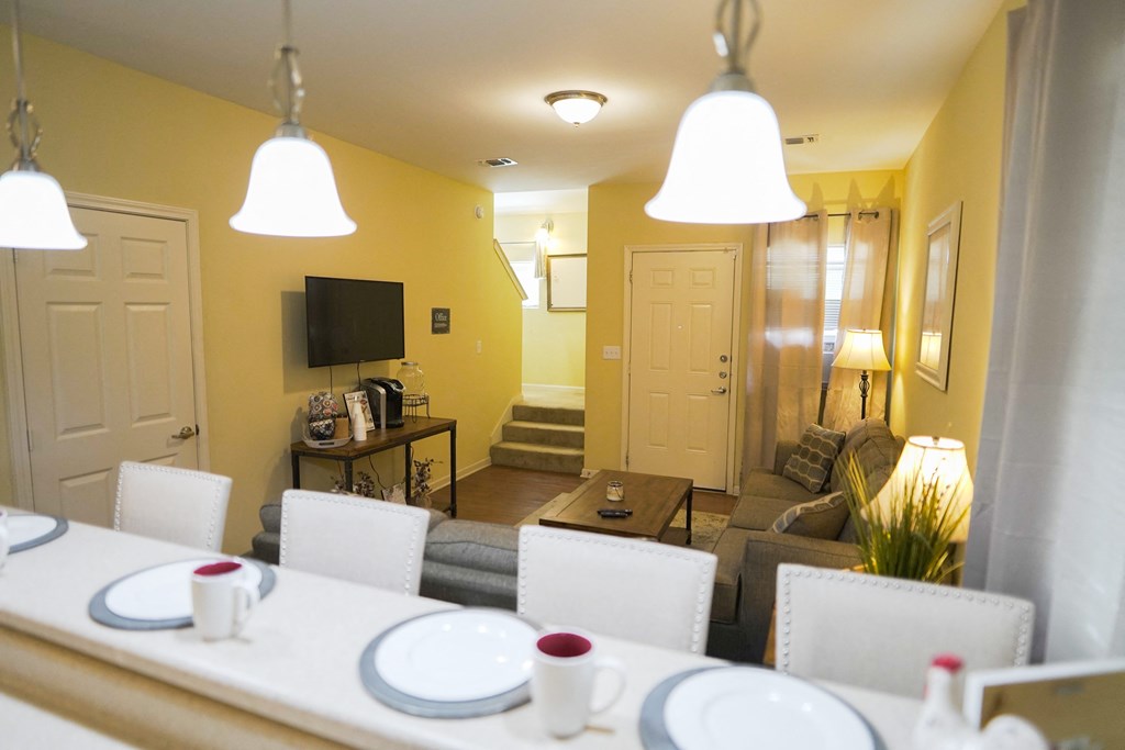 A dining bar with a table set for four.