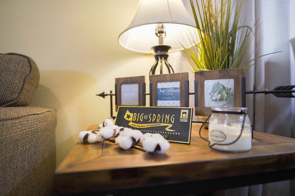 A table with a sign that says Big Spring and some jars.