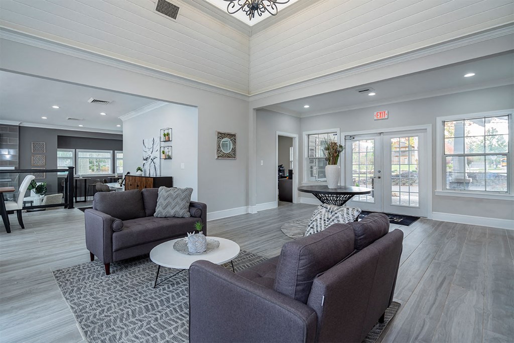 a living room with couches and a coffee table