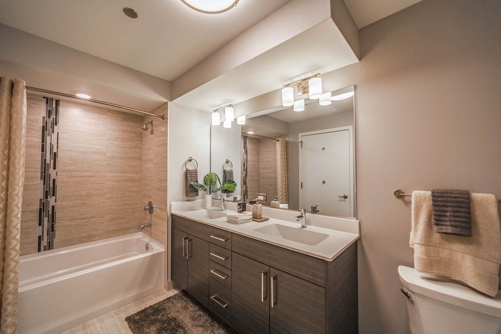 bahtroom vanity with tub shower combination