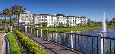 Ancora Apartments Orlando Florida walkway next to lake