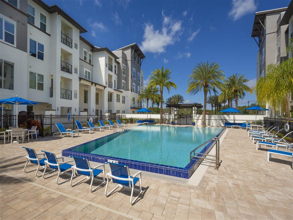 Ancora Apartments Orlando Florida swimming pool next to a building