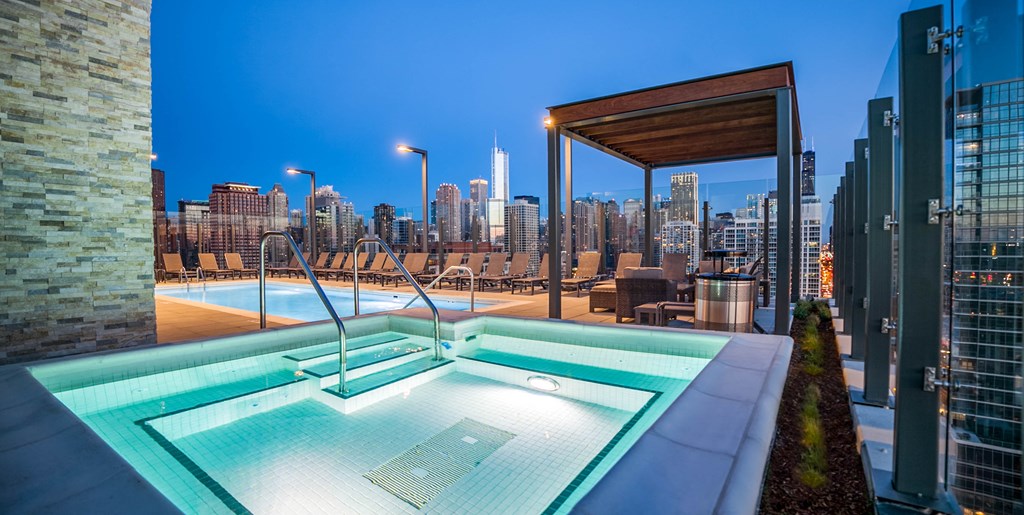 Rooftop hot tub at night