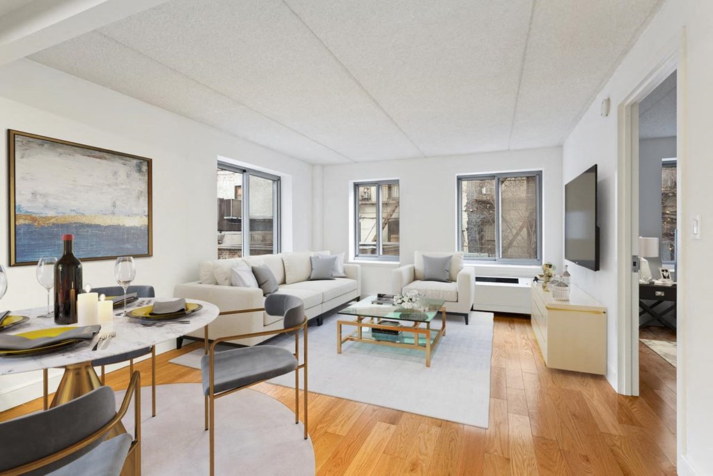 a living room with a couch and a table