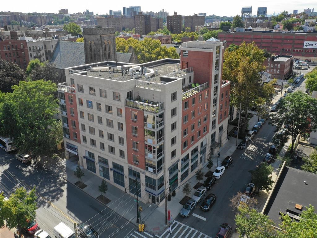 an aerial view of a building in the city