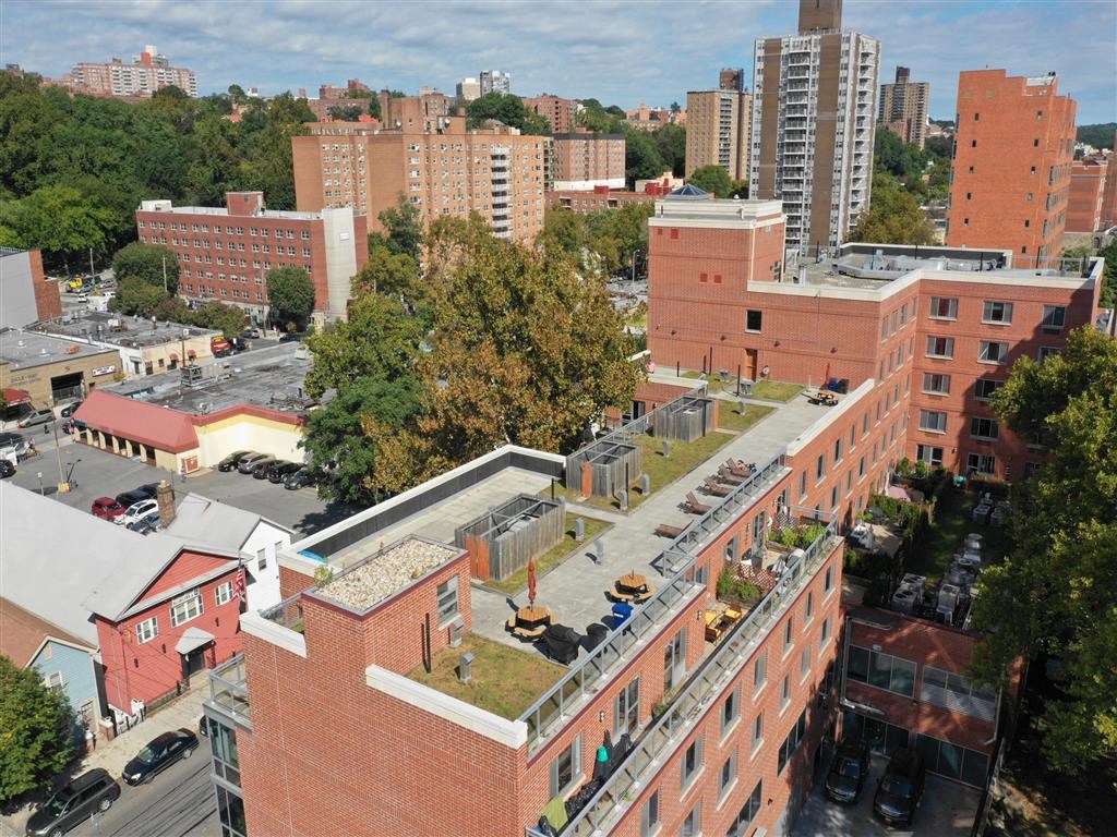 a green roof on a building in a city