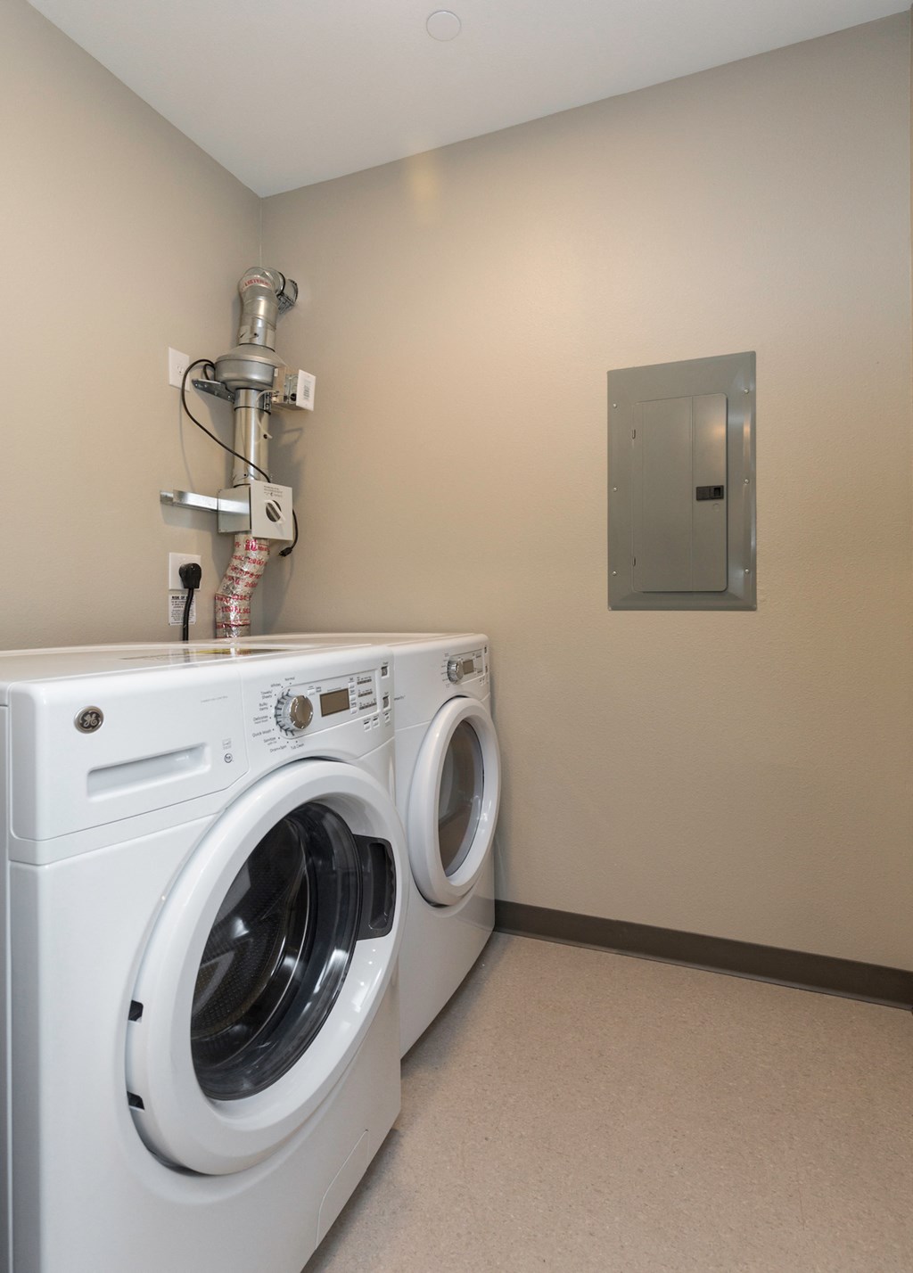 a washer and dryer in the laundry room of a home