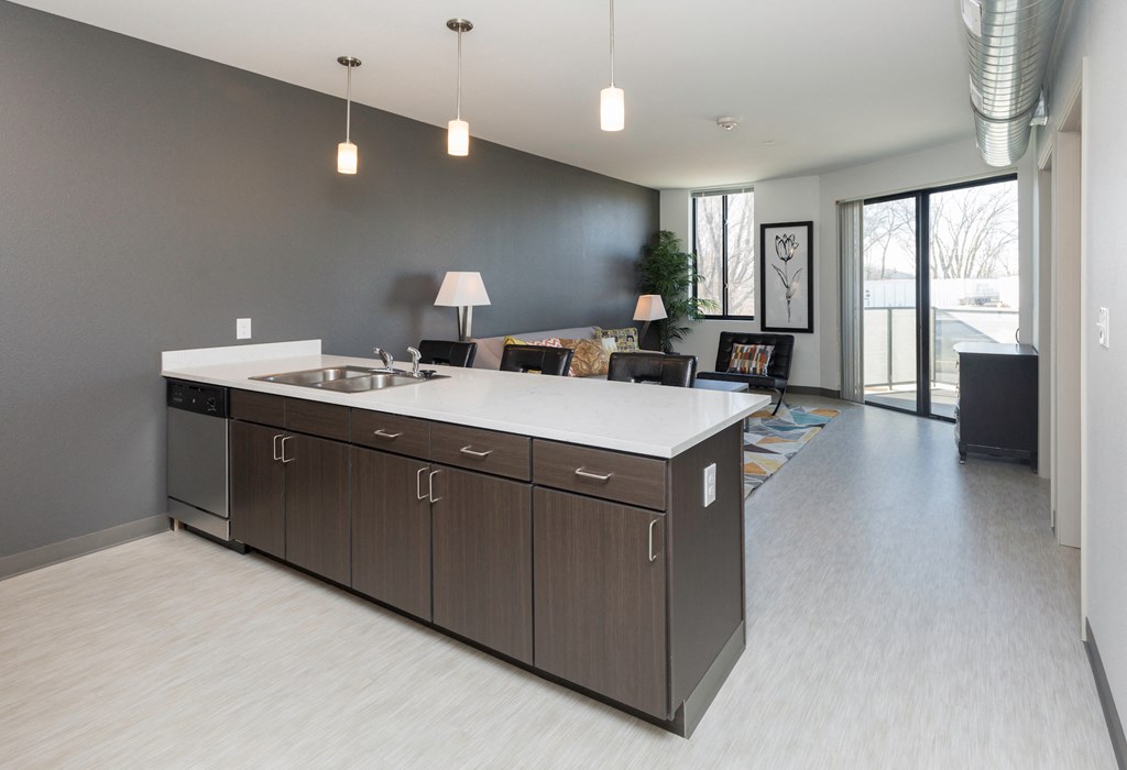 an open kitchen and living room in an apartment
