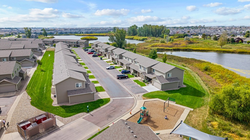 A residential area with houses and a playground.