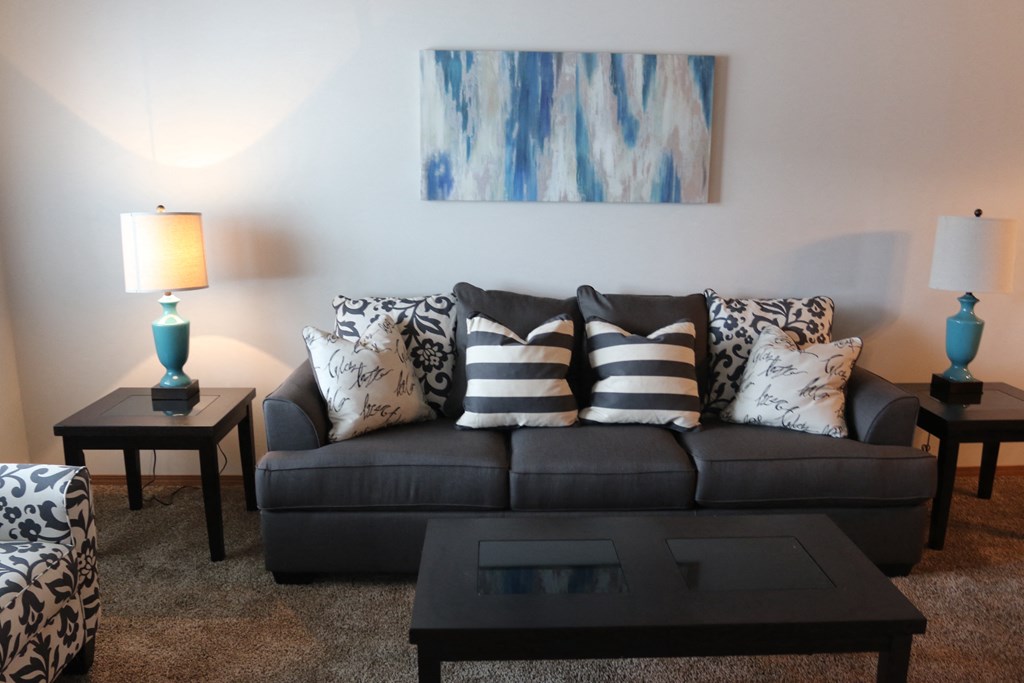 a living room with a couch and a coffee table