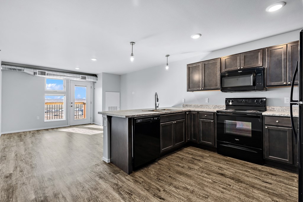 Kitchen overlooking into Living Room