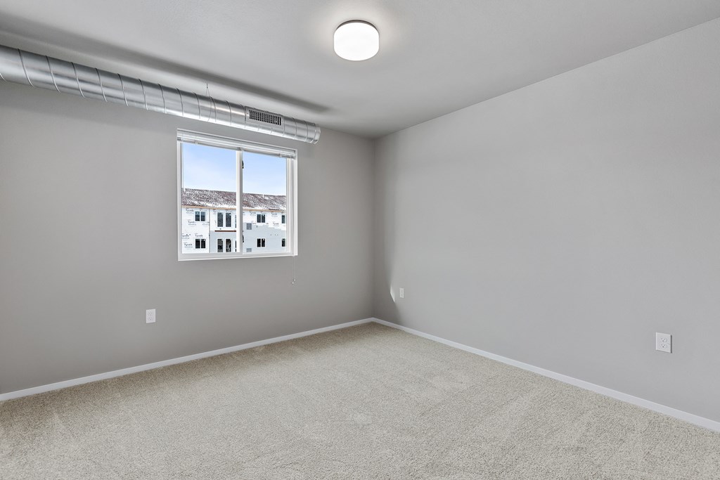 bedroom with large windows