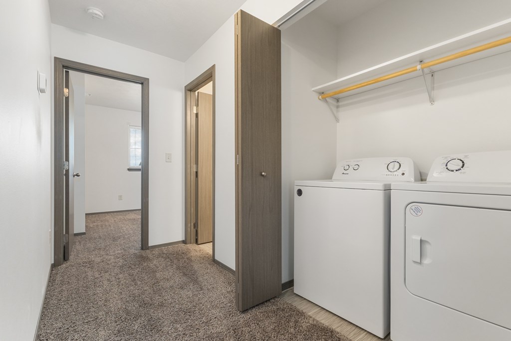 A laundry room with a washer and dryer.