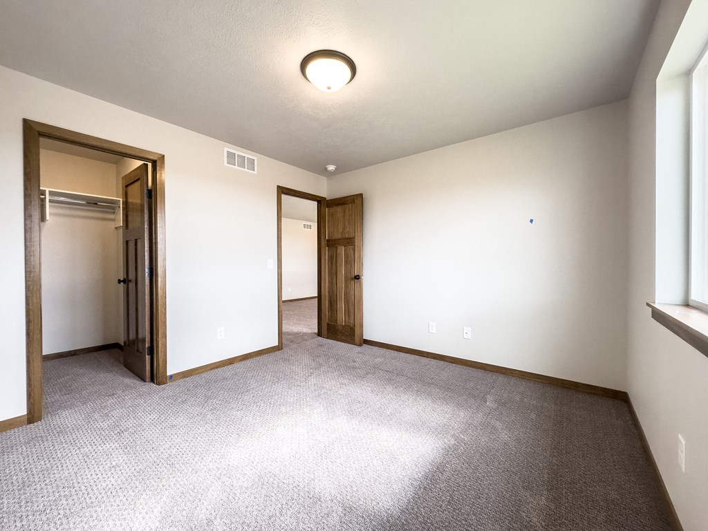 the upstairs bedroom is empty and ready for you to move in to your new home