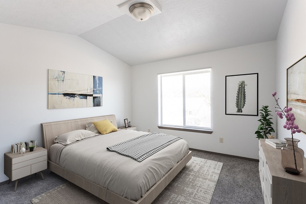 Master bedroom with en suite bathroom and double closets.