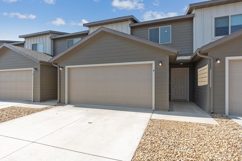 a garage door in front of a house