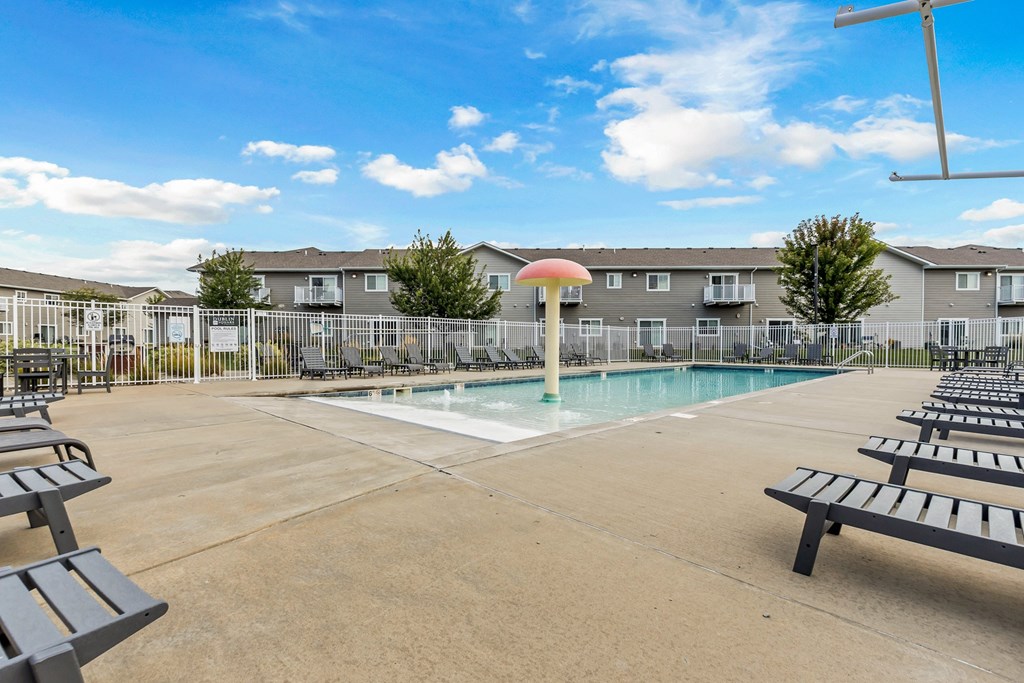 A sunny day at the pool of a residential complex.