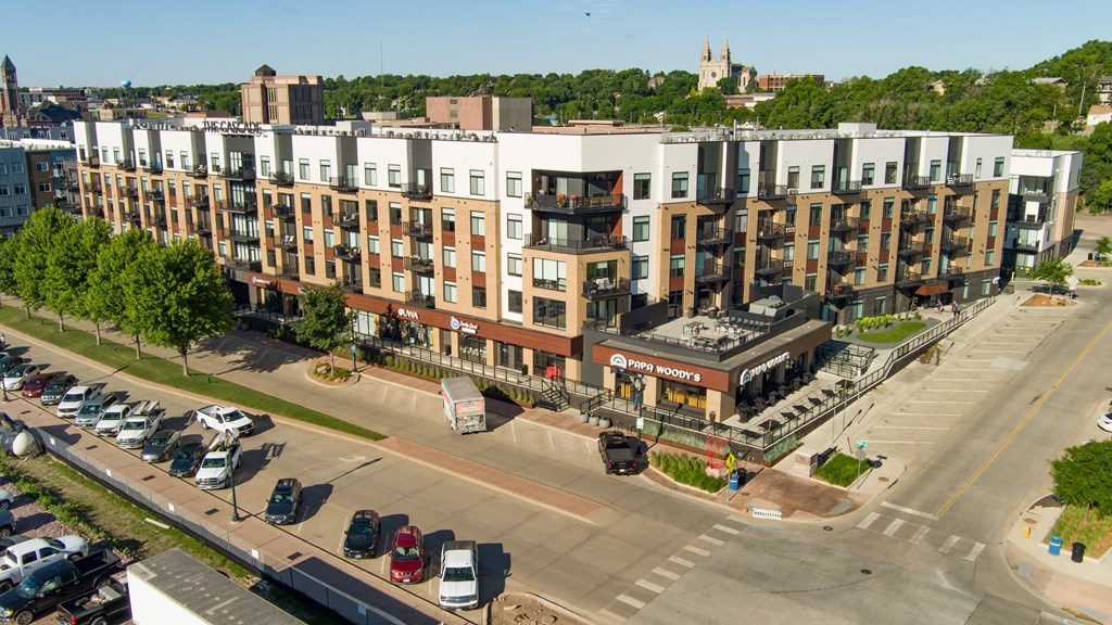 an aerial view of a building on a city street