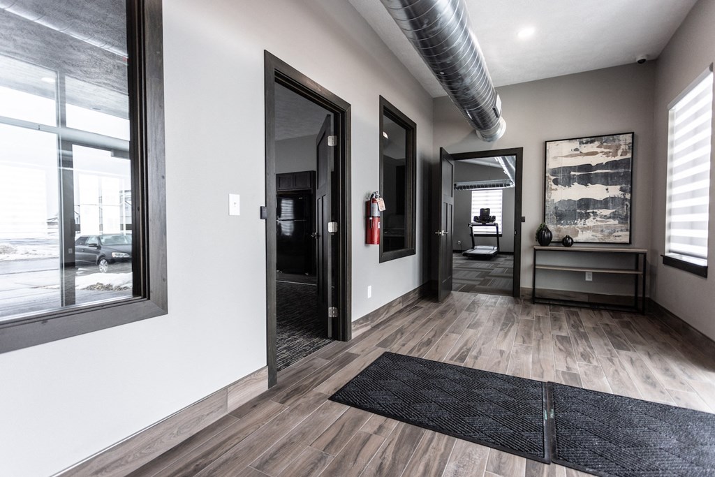 the entrance to the leasing office of a new apartment building