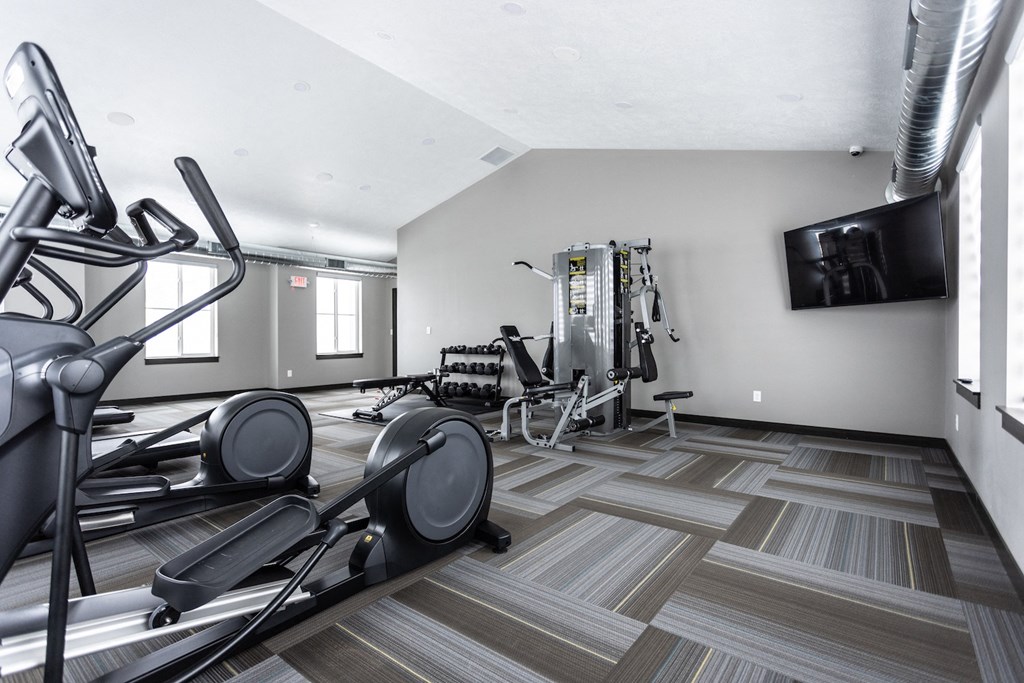 the gym at the flats at big tex apartments