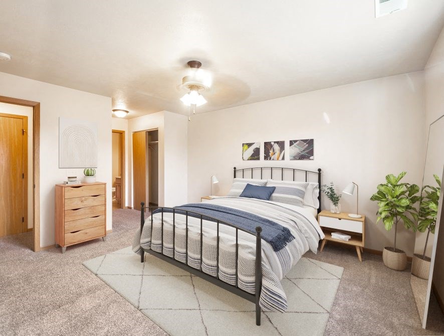 a bedroom with a bed and a closet