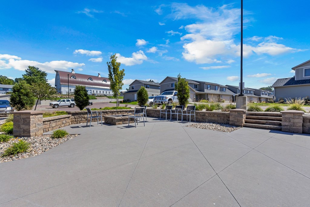 A sunny day at a residential complex with a clear blue sky.