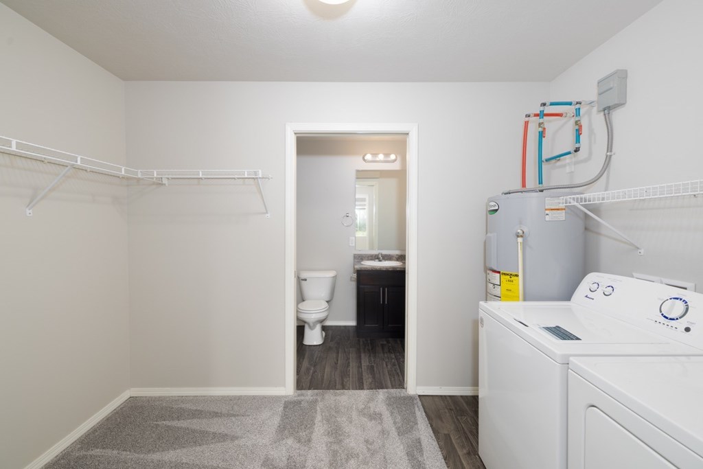 A laundry room with a washer and dryer.