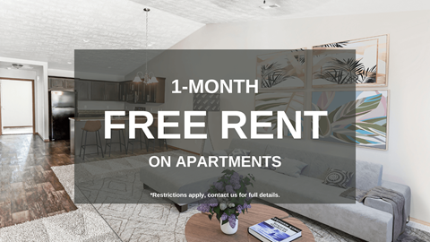 a living room with a couch and a table and a free rent on apartments