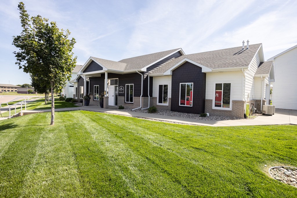 a house with a yard in front of it