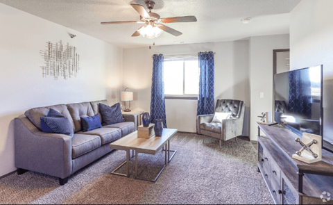 a living room with a couch and a tv