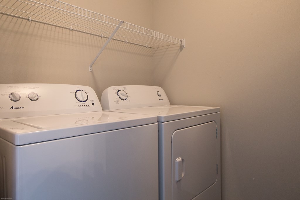 a washer and dryer in the laundry room of a home