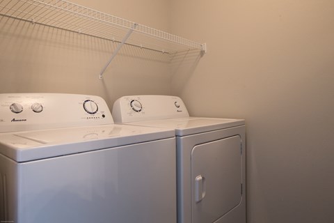 a washer and dryer in the laundry room of a home