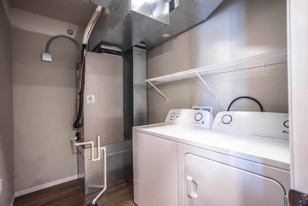 a laundry room with a washer and a dryer