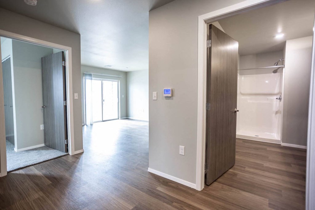 a renovated living room and closet in a new home