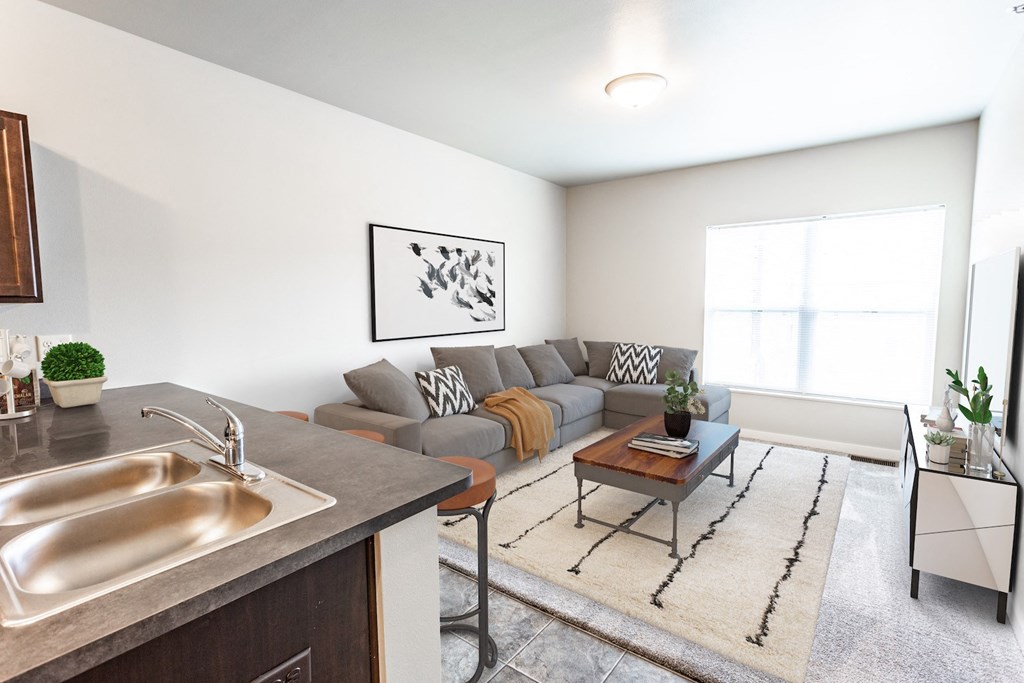 a living room with a couch and a table
