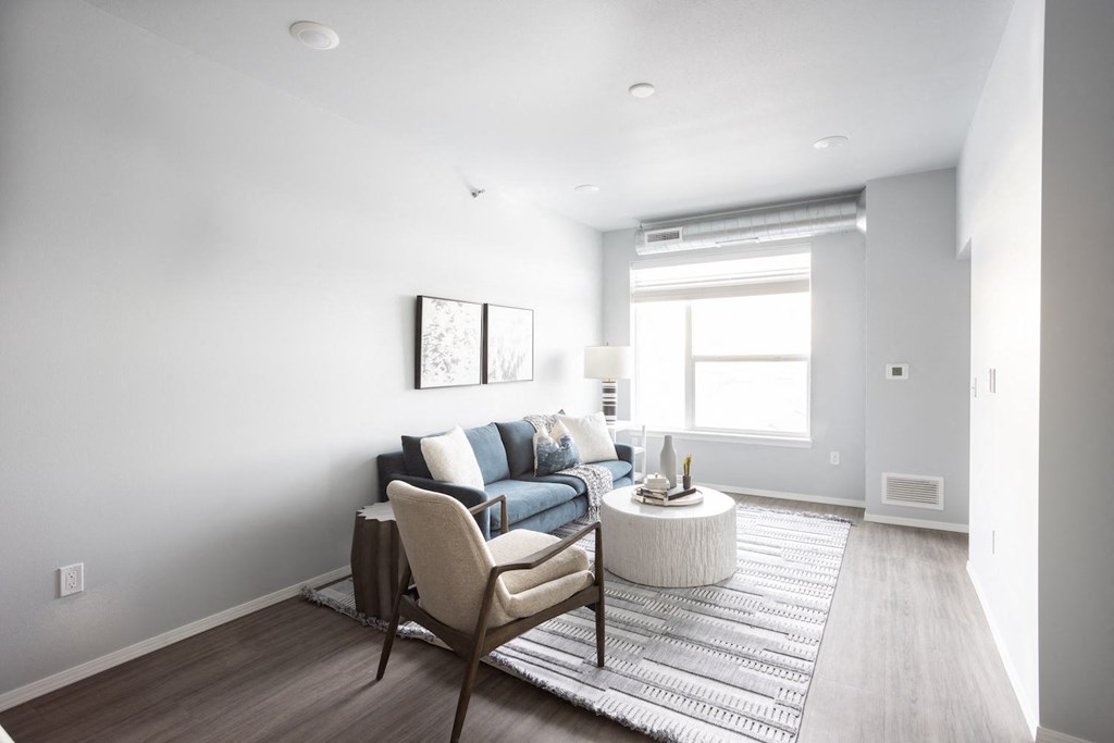 a living room with a couch and a coffee table