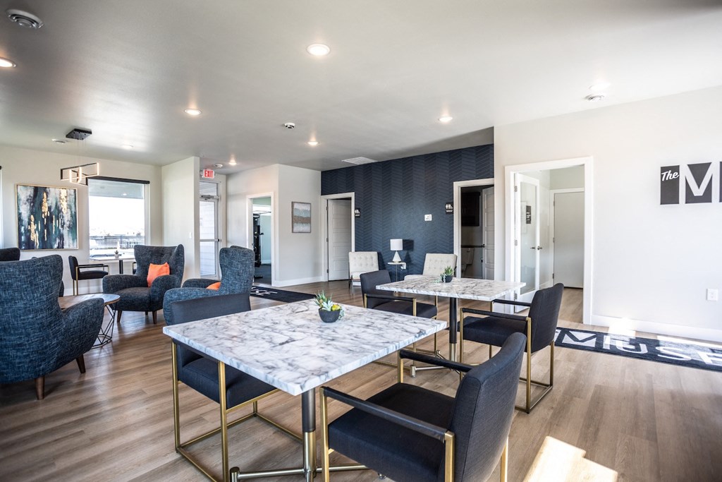 a communal area with tables and chairs at the preserve at ballantyne commons